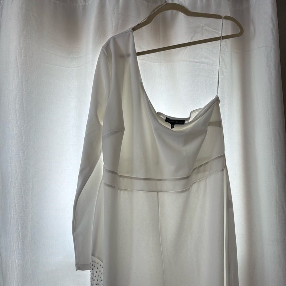 White bridal jumpsuit. Size 3XL. Purchased new and was never worn.